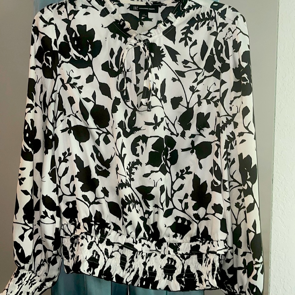 Woman’s silk blouse size Large
